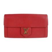 Pre-owned Leather wallets Louis Vuitton Vintage , Red , Dames