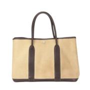 Pre-owned Canvas handbags Hermès Vintage , Beige , Dames