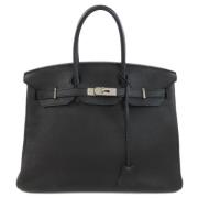 Pre-owned Fabric handbags Hermès Vintage , Black , Dames