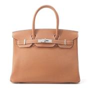 Pre-owned Leather handbags Hermès Vintage , Brown , Dames