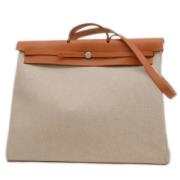 Pre-owned Canvas handbags Hermès Vintage , Beige , Dames