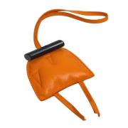 Pre-owned Leather key-holders Hermès Vintage , Orange , Dames