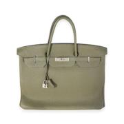 Pre-owned Leather handbags Hermès Vintage , Green , Dames