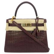 Pre-owned Leather handbags Hermès Vintage , Brown , Dames