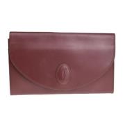 Pre-owned Leather clutches Cartier Vintage , Red , Dames