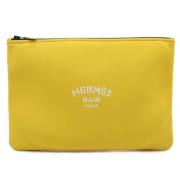 Pre-owned Canvas clutches Hermès Vintage , Yellow , Dames