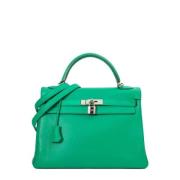 Pre-owned Leather handbags Hermès Vintage , Green , Dames