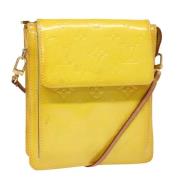 Pre-owned Leather pouches Louis Vuitton Vintage , Yellow , Dames