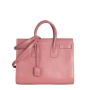 Pre-owned Leather handbags Yves Saint Laurent Vintage , Pink , Dames