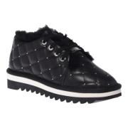 Trainers van zwart gewatteerd leer met studs Baldinini , Black , Dames