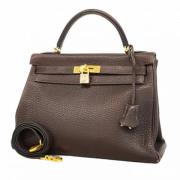 Pre-owned Leather handbags Hermès Vintage , Brown , Dames