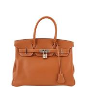 Pre-owned Canvas handbags Hermès Vintage , Brown , Dames