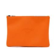 Pre-owned Plastic clutches Hermès Vintage , Orange , Dames