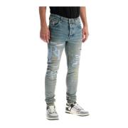 Versleten leren logo skinny jeans Amiri , Blue , Heren