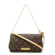 Pre-owned Fabric handbags Louis Vuitton Vintage , Brown , Dames