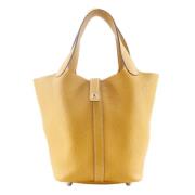 Pre-owned Leather handbags Hermès Vintage , Yellow , Dames