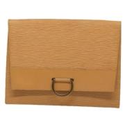 Pre-owned Leather clutches Louis Vuitton Vintage , Beige , Dames