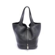 Pre-owned Leather handbags Hermès Vintage , Black , Dames