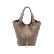 Pre-owned Leather handbags Hermès Vintage , Brown , Dames