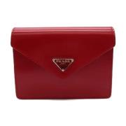 Pre-owned Leather clutches Prada Vintage , Red , Dames