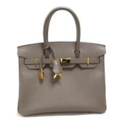 Pre-owned Leather handbags Hermès Vintage , Brown , Dames