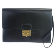 Pre-owned Leather clutches Hermès Vintage , Black , Dames