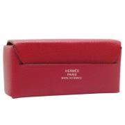 Pre-owned Leather pouches Hermès Vintage , Red , Dames