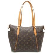 Pre-owned Canvas shoulder-bags Louis Vuitton Vintage , Brown , Dames