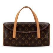 Pre-owned Canvas handbags Louis Vuitton Vintage , Brown , Dames