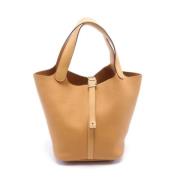 Pre-owned Leather handbags Hermès Vintage , Brown , Dames