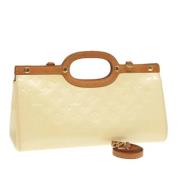 Pre-owned Leather handbags Louis Vuitton Vintage , Beige , Dames