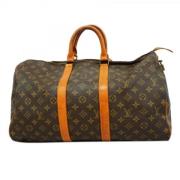 Pre-owned Fabric handbags Louis Vuitton Vintage , Brown , Dames