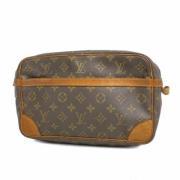 Pre-owned Fabric clutches Louis Vuitton Vintage , Brown , Dames