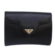 Pre-owned Leather clutches Yves Saint Laurent Vintage , Black , Dames