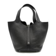 Pre-owned Leather handbags Hermès Vintage , Black , Dames