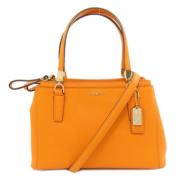 Pre-owned Leather handbags Coach Pre-owned , Orange , Dames