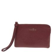 Pre-owned Leather clutches Coach Pre-owned , Brown , Dames