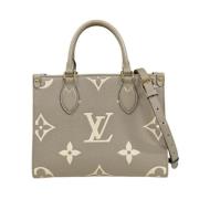 Pre-owned Canvas handbags Louis Vuitton Vintage , Beige , Dames