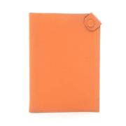 Pre-owned Leather home-office Hermès Vintage , Orange , Dames