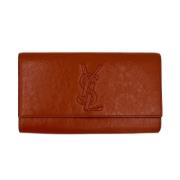 Pre-owned Leather clutches Yves Saint Laurent Vintage , Orange , Dames