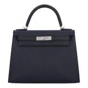 Pre-owned Leather handbags Hermès Vintage , Black , Unisex