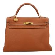 Pre-owned Leather handbags Hermès Vintage , Brown , Dames