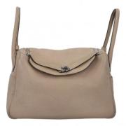 Pre-owned Leather shoulder-bags Hermès Vintage , Beige , Dames