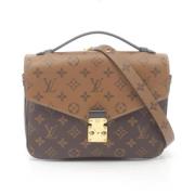 Pre-owned Canvas handbags Louis Vuitton Vintage , Black , Dames