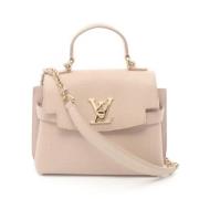 Pre-owned Leather handbags Louis Vuitton Vintage , Beige , Dames