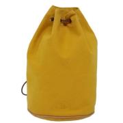 Pre-owned Canvas backpacks Hermès Vintage , Yellow , Unisex