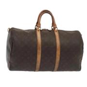 Pre-owned Canvas travel-bags Louis Vuitton Vintage , Brown , Dames