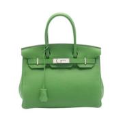 Pre-owned Leather handbags Hermès Vintage , Green , Dames