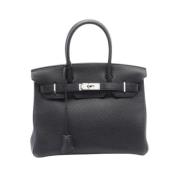 Pre-owned Leather handbags Hermès Vintage , Black , Dames