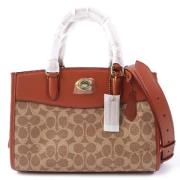 Pre-owned Canvas handbags Coach Pre-owned , Brown , Dames